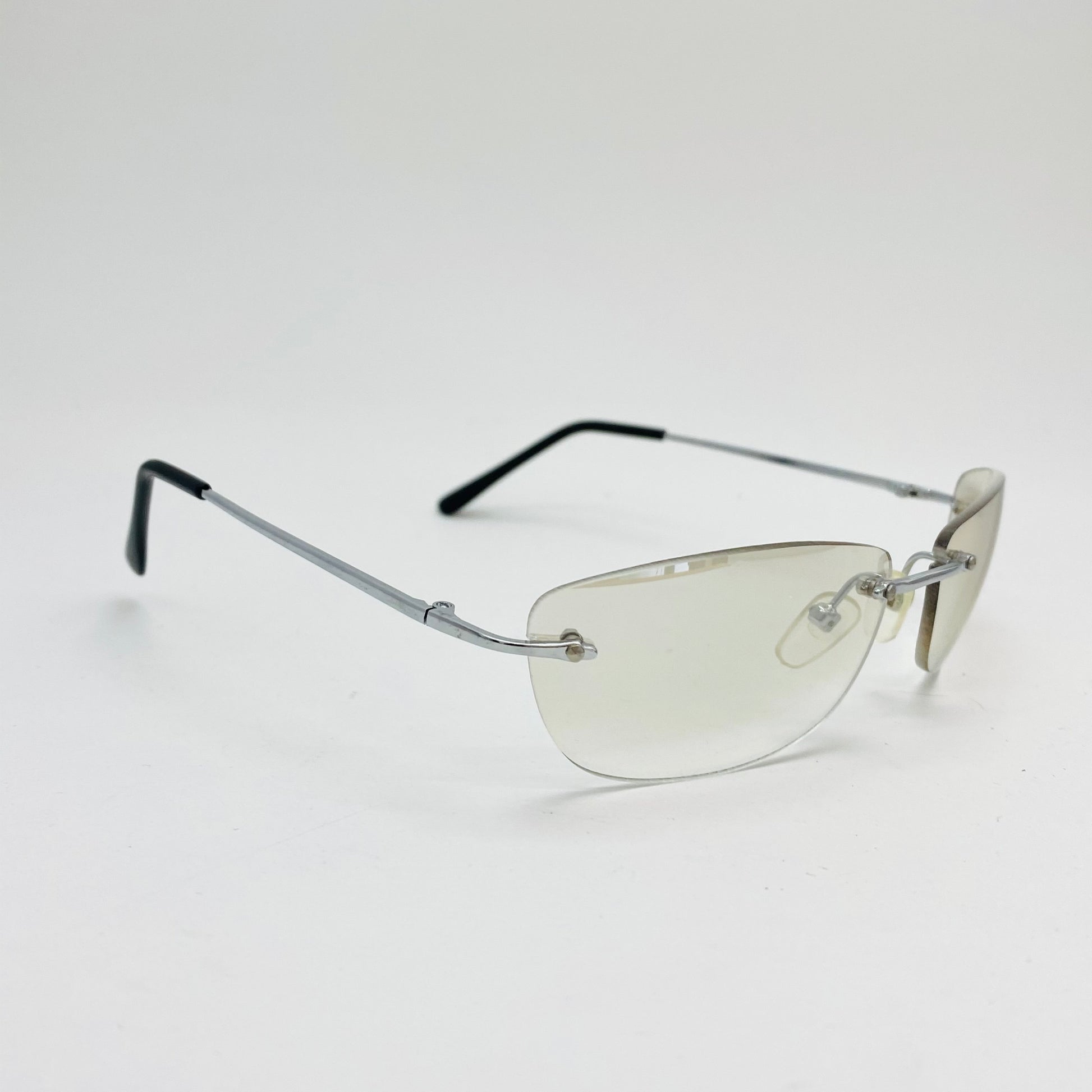 grunge style, clear lens, rimless frame, vintage sunglasses with silver color