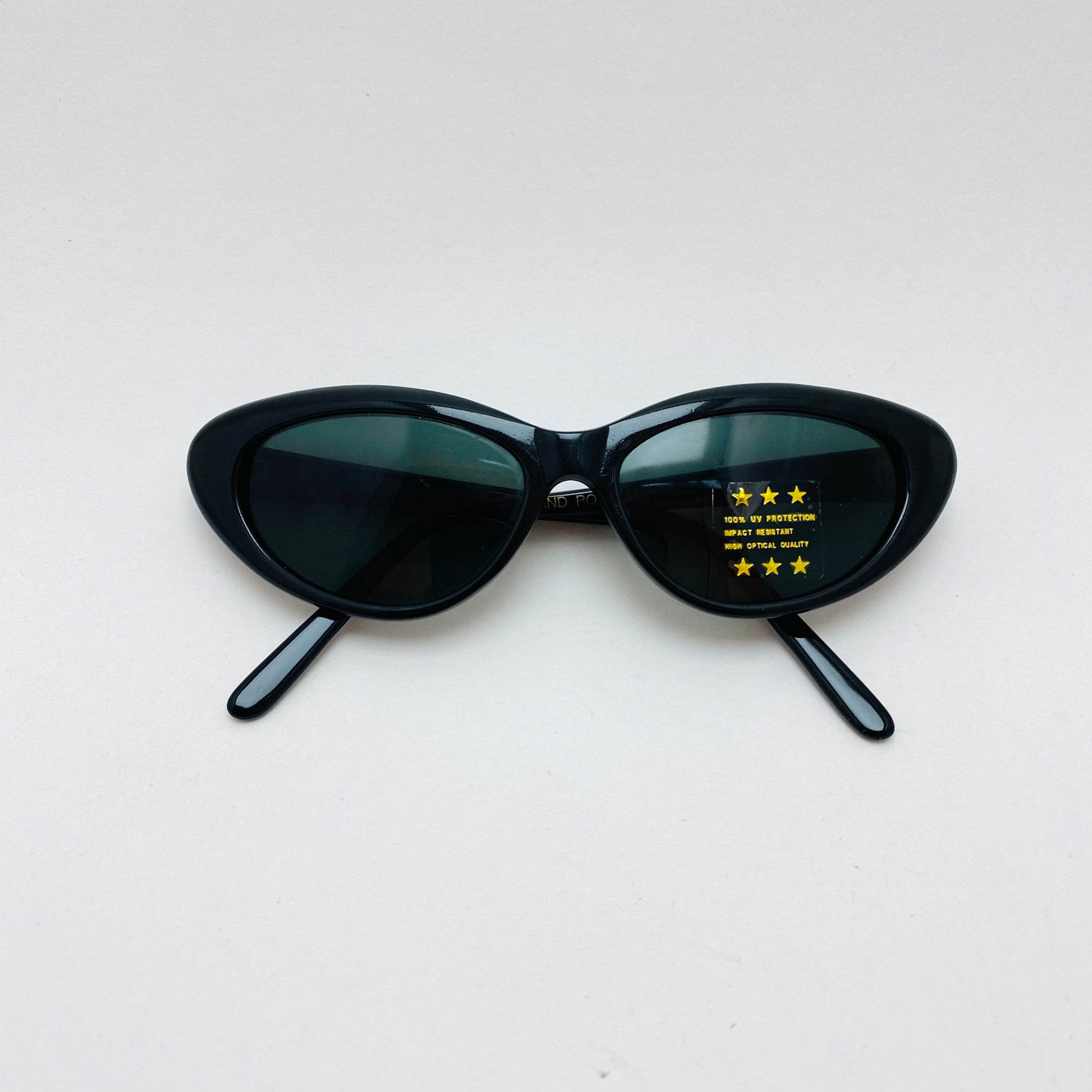 true vintage solid triangular frame sunnies with tinted lens 