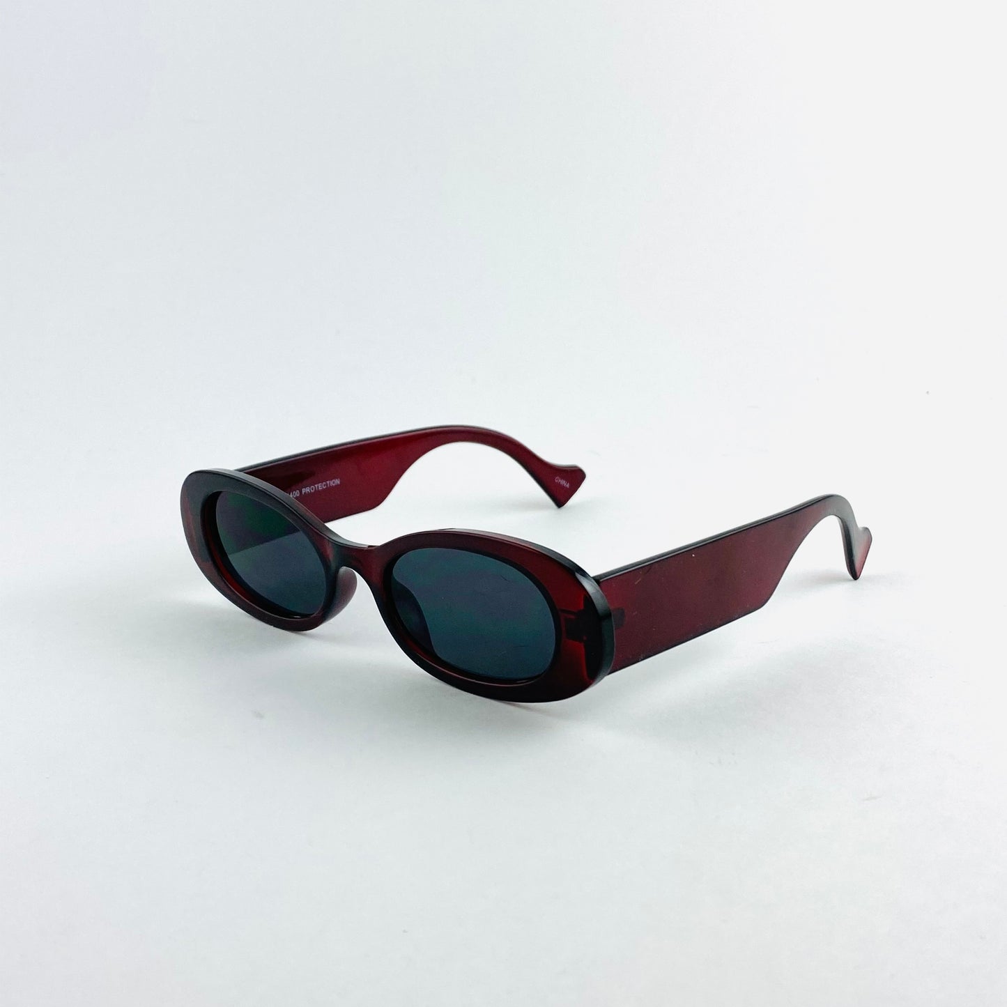Mod style rectangle oversized sunglasses with thick frames and dark colored tints